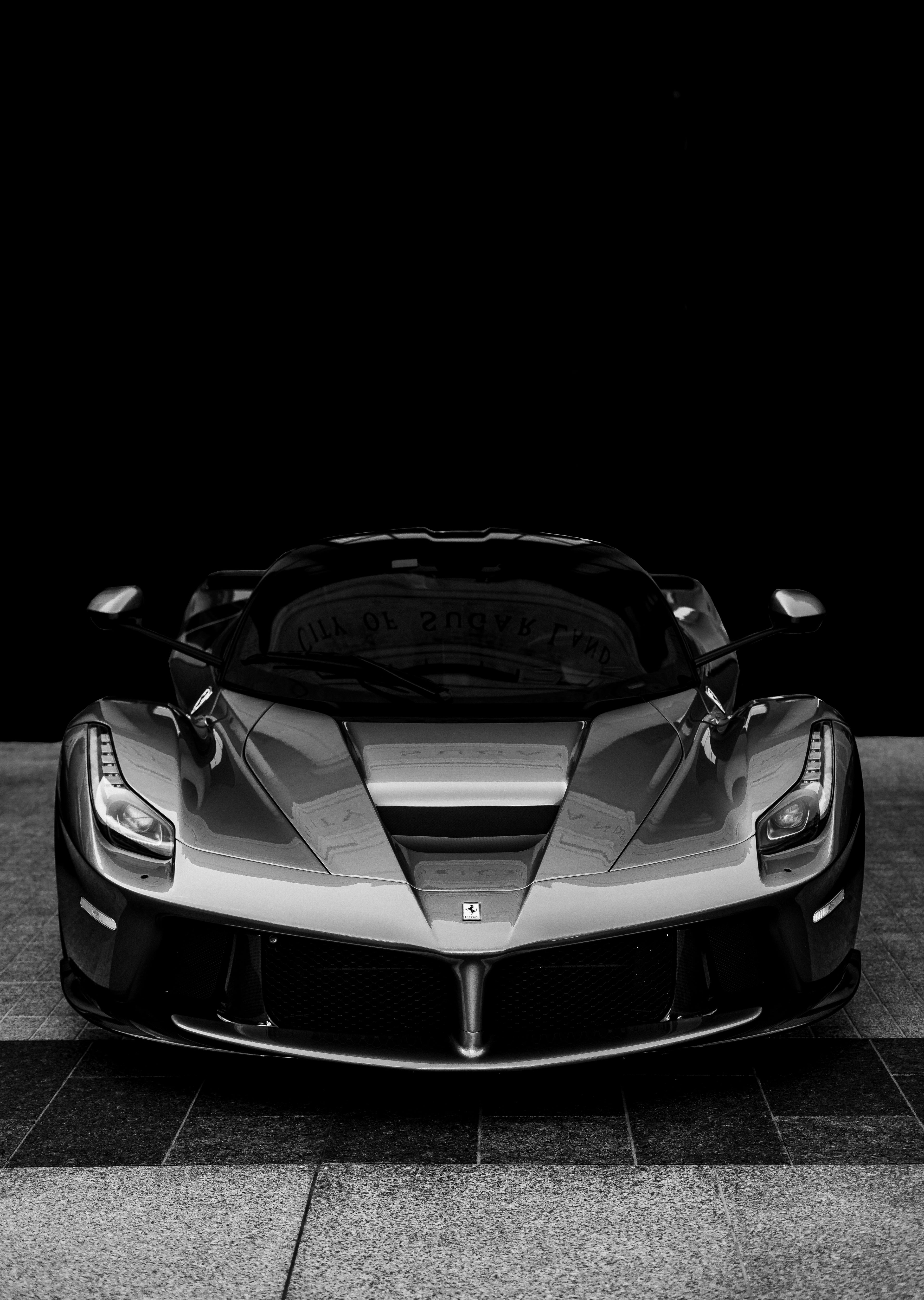 Black and white front view of a Ferrari LaFerrari